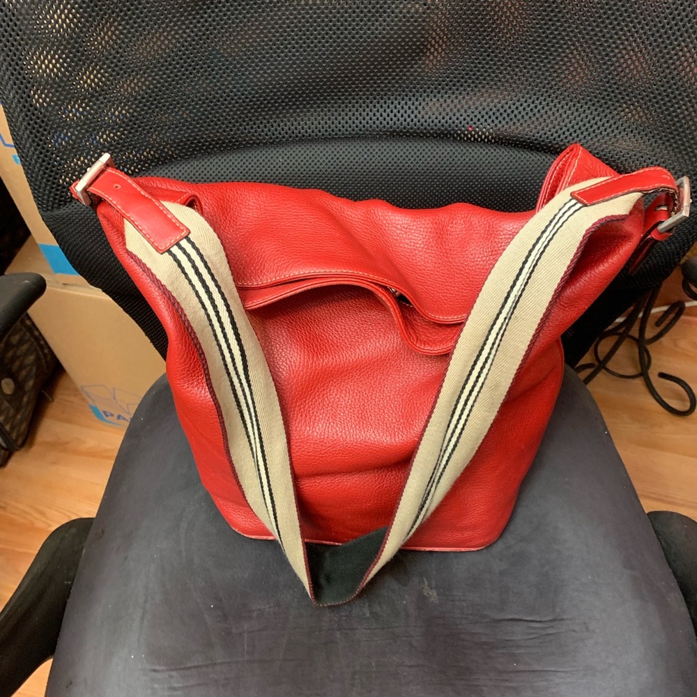 Red Burberry bucket bag.